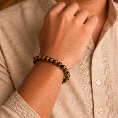 Man wearing a tiger eye bracelet